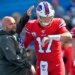 Buffalo Bills offensive coordinator Brian Daboll, left, encourages quarterback Josh Allen as he warms up before an NFL football game Miami Dolphins, Sunday, Oct. 20, 2019, in Orchard Park, N.Y.
