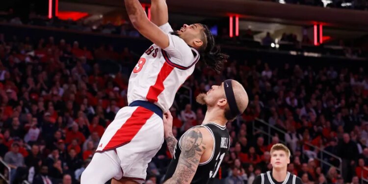 Bryce Hopkins #23 of the St. John's Red Storm goes up for a shot over Duncan Powell #31 of the Providence Friars during the second half when the St. John's Red Storm played the Providence Friars Saturday, January 3, 2026 at Madison Square Garden