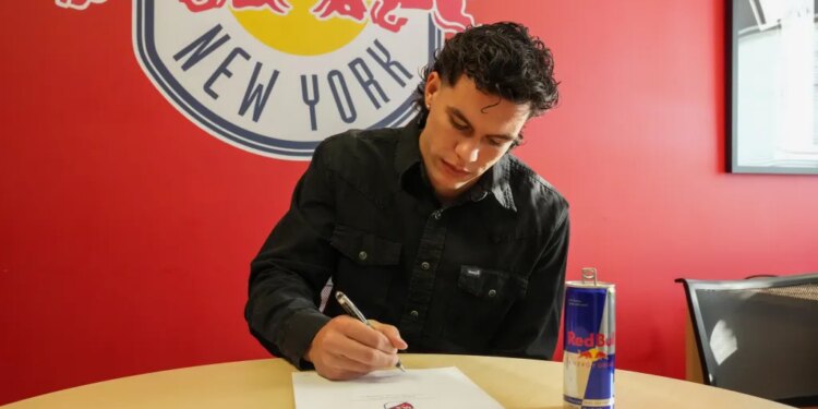 Red Bull New York player Cade Cowell, signing his contract.