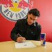 Red Bull New York player Cade Cowell, signing his contract.