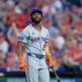 Cedric Mullins in a New York Mets uniform, batting gloves and helmet, holding a bat after striking out.