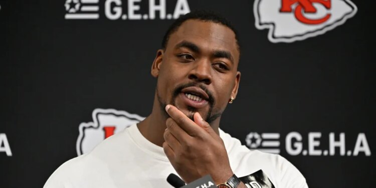 Chris Jones, defensive tackle for the Kansas City Chiefs, speaks during a press conference.