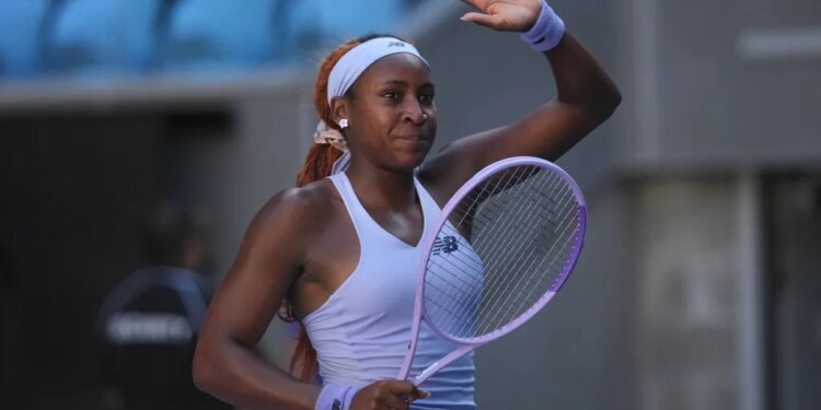 Coco Gauff waves to the crowd after her three-set victory over fellow American Hailey Baptiste in the third round of the Australian Open on Jan. 23, 2026.