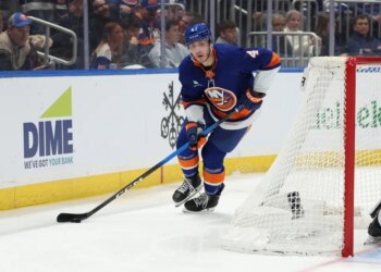 Islanders defenseman Cole McWard (4) skates with the puck against the Toronto Maple Leafs during the third period at UBS Arena.