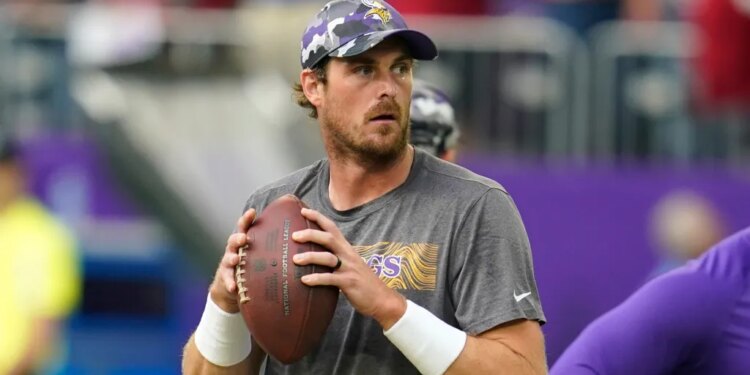 Minnesota Vikings quarterback Sean Mannion warms up before a preseason NFL football game against the San Francisco 49ers, Aug. 20, 2022, in Minneapolis. (