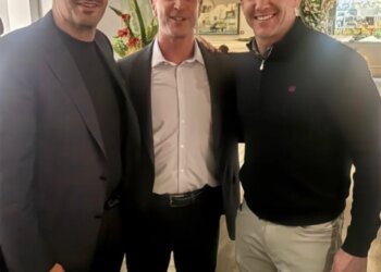 John Harbaugh smiles beside Joe Schoen at Elia Mediterranean Restaurant.