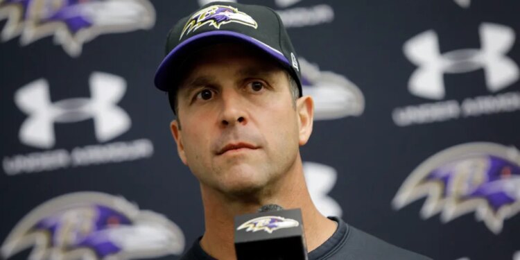 John Harbaugh, head coach for the Baltimore Ravens, speaks at a news conference.