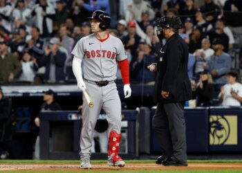 Boston Red Sox player Alex Bregman reacts after striking out in a game against the New York Yankees.