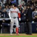 Boston Red Sox player Alex Bregman reacts after striking out in a game against the New York Yankees.