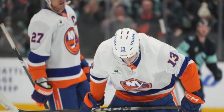 New York Islanders center Mathew Barzal looks down after a goal by Seattle Kraken defenseman Vince Dunn during the second period of an NHL hockey game Wednesday, Jan. 21, 2026, in Seattle.