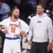 New York Knicks guard Jalen Brunson #11 speaks with New York Knicks guard Josh Hart #3 off the bench during the fourth quarter.