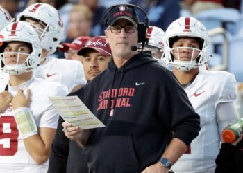 Stanford head coach Frank Reich watches during the first half of an NCAA college football game against North Carolina, Nov. 8, 2025, in Chapel Hill, N.C.