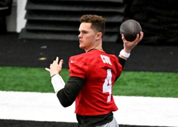Jets quarterback Brady Cook (4) throws a pass during practice in Florham Park, NJ.