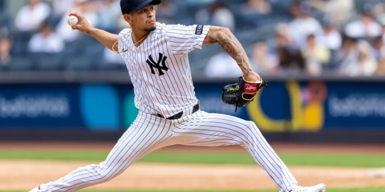 Jonathan Loáisiga #43 pitching against the Athletics.