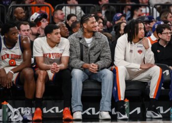 New York Knicks guard Josh Hart (3) looks on from the bench during the first half against the Phoenix Suns at Madison Square Garden.