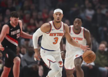 New York Knicks guard Josh Hart (3) brings the ball up court against the Portland Trail Blazers during the first half of an NBA basketball game, Sunday, Jan. 11, 2026, in Portland, Ore.