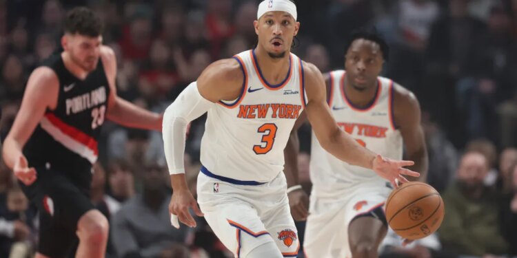 New York Knicks guard Josh Hart (3) brings the ball up court against the Portland Trail Blazers during the first half of an NBA basketball game, Sunday, Jan. 11, 2026, in Portland, Ore.
