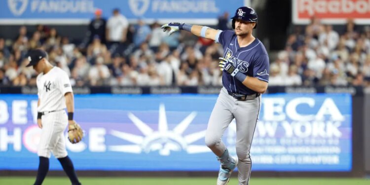 Josh Lowe reacts as he rounds the bases on his two-run homer