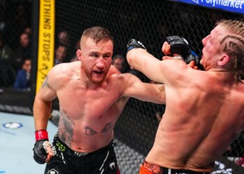 Justin Gaethje punches Paddy Pimblett in the UFC lightweight interim championship bout during UFC 324 at T-Mobile Arena on Jan. 24, 2026, in Las Vegas