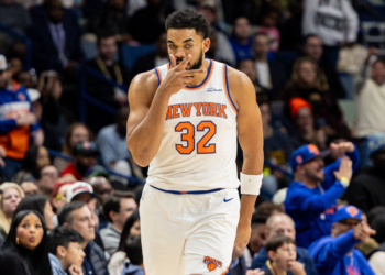 New York Knicks center/forward Karl-Anthony Towns (32) reacts to a play against the New Orleans Pelicans during the second half at Smoothie King Center.