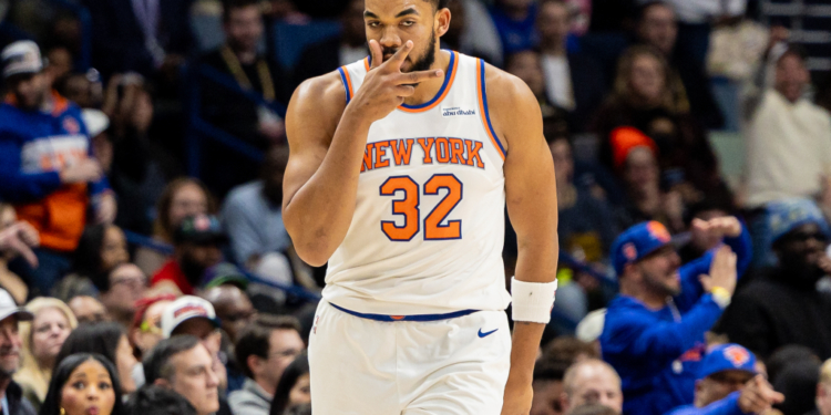 New York Knicks center/forward Karl-Anthony Towns (32) reacts to a play against the New Orleans Pelicans during the second half at Smoothie King Center.