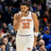 New York Knicks center/forward Karl-Anthony Towns (32) reacts to a play against the New Orleans Pelicans during the second half at Smoothie King Center.