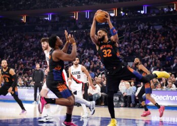 Karl-Anthony Towns #32 of the New York Knicks pulls down a rebound in the first half at Madison Square Garden in New York, New York, Friday, January 30, 2026.