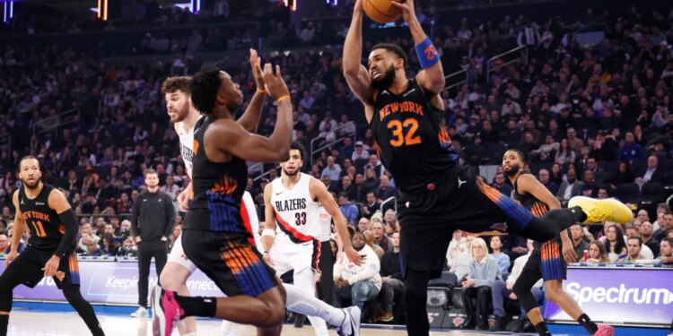 Karl-Anthony Towns #32 of the New York Knicks pulls down a rebound in the first half at Madison Square Garden in New York, New York, Friday, January 30, 2026.