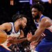 Jalen Brunson drives to the basket as Philadelphia 76ers center Joel Embiid defends in the second half at Madison Square Garden in Manhattan, New York, Saturday, January 03, 2026.