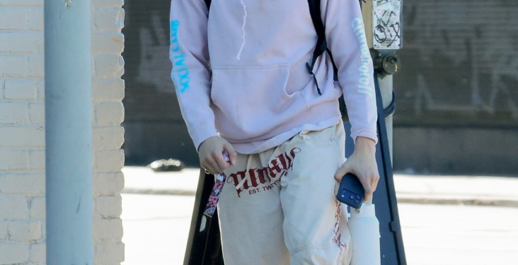 Knox Jolie-Pitt in a pink hoodie and graphic pants after a Muay Thai training session in Los Angeles.