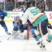 Kristyna Kaltounkova (98), who scored two goals, brings the puck around the net to shoot at goaltender Elaine Chuli, second left, during the first period of the Sirens' 2-0 win over the Sceptres on Jan. 6, 2025 in Toronto.