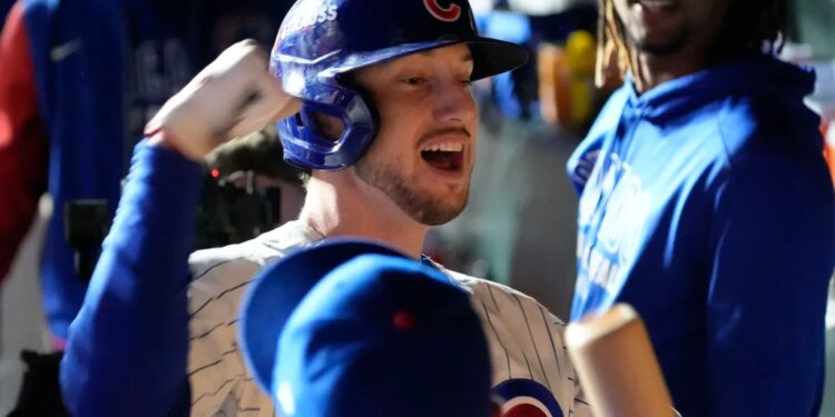 Chicago Cubs right fielder Kyle Tucker reacts after hitting a home run.