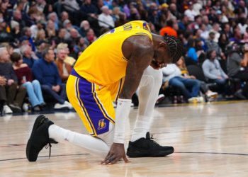 Los Angeles Lakers center Deandre Ayton reacting to being injured against the Denver Nuggets.
