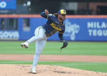Freddy Peralta #51 of the Milwaukee Brewers throws a pitch during the first inning.
