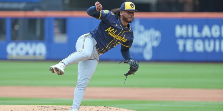 Freddy Peralta #51 of the Milwaukee Brewers throws a pitch during the first inning.