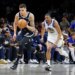 Michael Porter Jr. #17 of the Brooklyn Nets drives down court as De'Anthony Melton #8 of the Golden State Warriors gives chase during the second half when the Brooklyn Nets played the Golden State Warriors Monday, December 29, 2025 at Barclays Center in Brooklyn, NY.