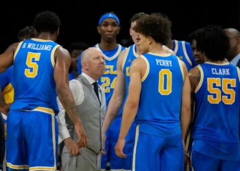 UCLA basketball coach Mick Cronin talking to his players.