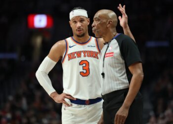 New York Knicks guard Josh Hart (3) talks with referee Leon Wood (40) during the second half at Moda Center.