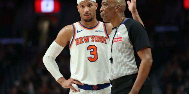 New York Knicks guard Josh Hart (3) talks with referee Leon Wood (40) during the second half at Moda Center.