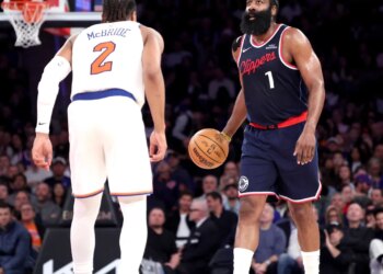 LA Clippers guard James Harden #1 looks for an opening as New York Knicks guard Miles McBride #2 defends during the third quarter.