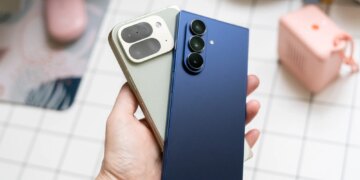 Samsung Galaxy Z Fold 7 and Google Pixel 10 Pro Fold shown in hand.