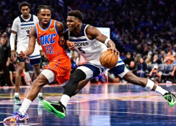 Minnesota Timberwolves guard Anthony Edwards (5) drives against Oklahoma City Thunder guard Cason Wallace (22).