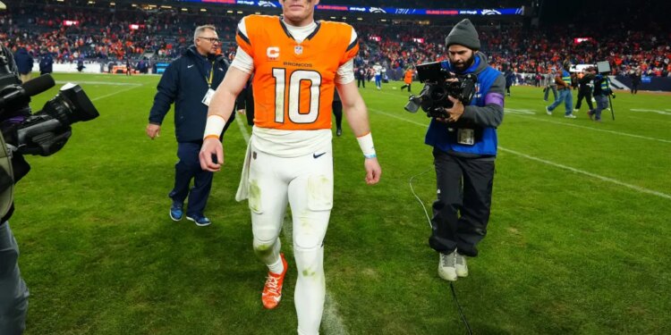 Denver Broncos quarterback Bo Nix (10) reacts after winning an AFC Divisional Round playoff game.