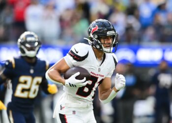 Houston Texans wide receiver Jayden Higgins (81) runs toward the end zone with the ball during a football game.