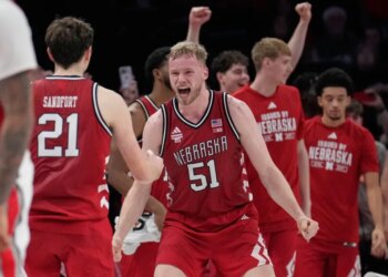 Nebraska forward Rienk Mast (51) celebrates with forward Pryce Sandfort (21) after Nebraska defeated Ohio State.
