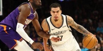Michael Porter Jr. who scored a game-high 36 points, drives on Mark Williams during the Nets' 106-102 loss to the Suns on Jan. 27, 2026 in Phoenix.