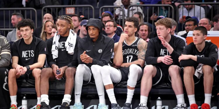The Brooklyn Nets bench looking dejected during the fourth quarter. The New York Knicks defeat Brooklyn Nets 120-66.