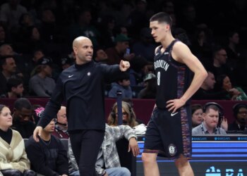 Brooklyn Nets head coach Jordi Fernandez taking to Brooklyn Nets guard Egor Demin #8, in the 3rd quarter.
