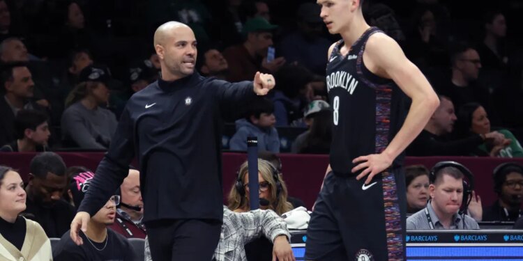 Brooklyn Nets head coach Jordi Fernandez taking to Brooklyn Nets guard Egor Demin #8, in the 3rd quarter.
