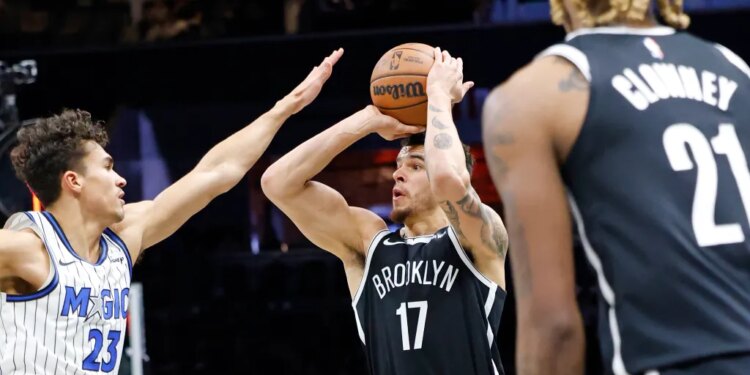 Brooklyn Nets forward Michael Porter Jr. (17) takes a shot during the first half against the Orlando Magic.